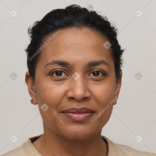 Joyful latino young-adult female with short  brown hair and brown eyes