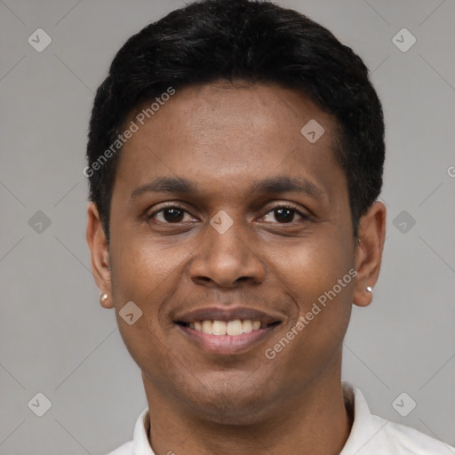 Joyful latino young-adult male with short  black hair and brown eyes