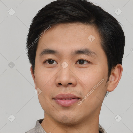 Neutral asian young-adult male with short  black hair and brown eyes