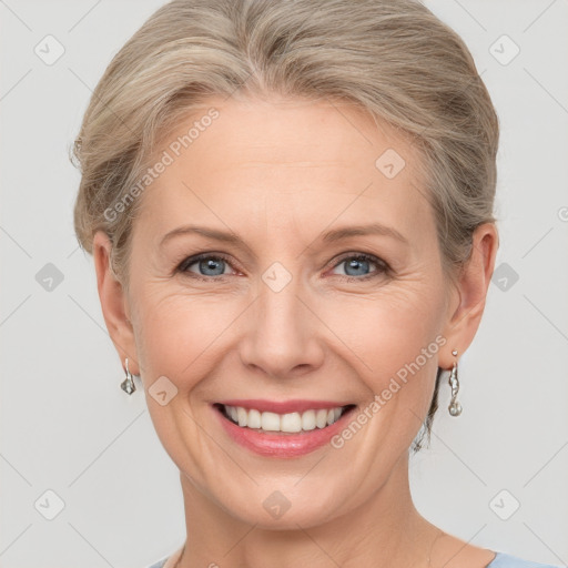 Joyful white adult female with short  brown hair and grey eyes