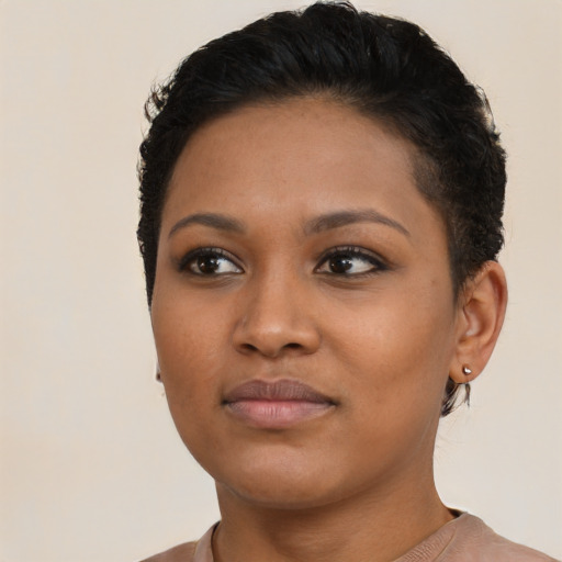 Neutral black young-adult female with short  black hair and brown eyes
