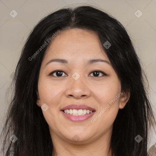 Joyful asian young-adult female with long  brown hair and brown eyes