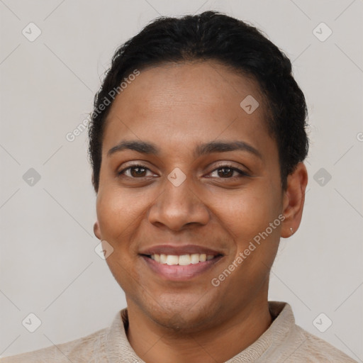 Joyful latino young-adult female with short  black hair and brown eyes