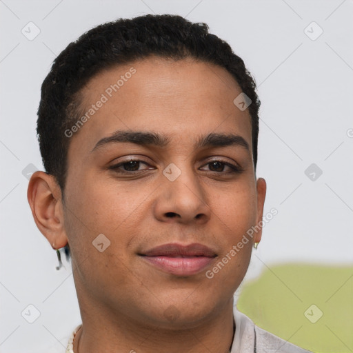 Joyful latino young-adult male with short  brown hair and brown eyes