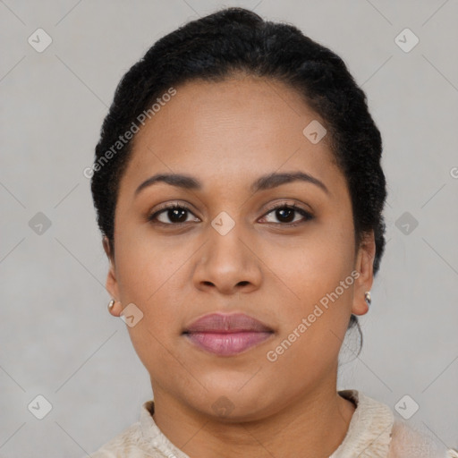 Joyful latino young-adult female with short  brown hair and brown eyes