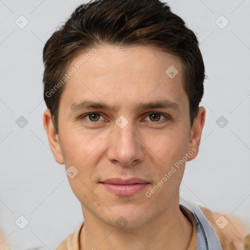 Joyful white adult male with short  brown hair and grey eyes