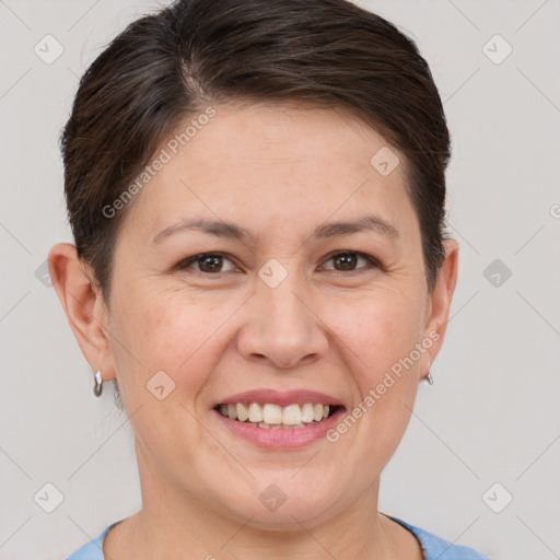 Joyful white adult female with short  brown hair and brown eyes