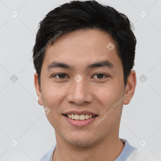 Joyful white young-adult male with short  black hair and brown eyes