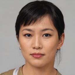 Neutral asian young-adult female with medium  black hair and brown eyes