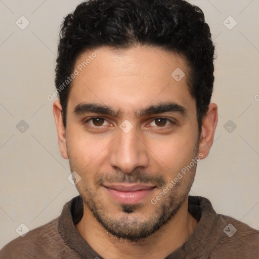 Joyful white young-adult male with short  black hair and brown eyes