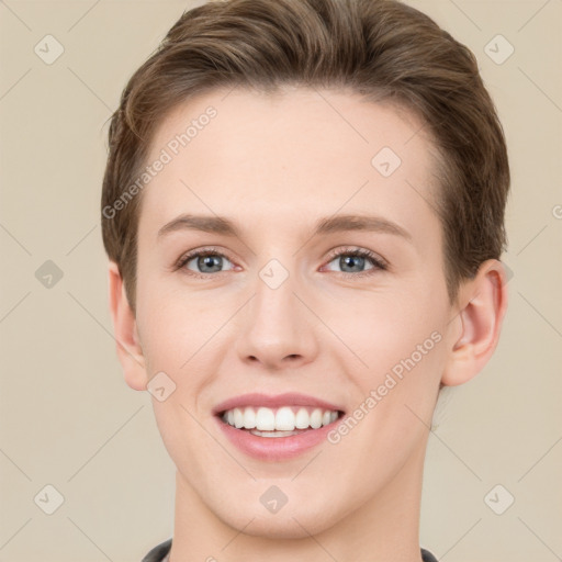 Joyful white young-adult female with short  brown hair and grey eyes