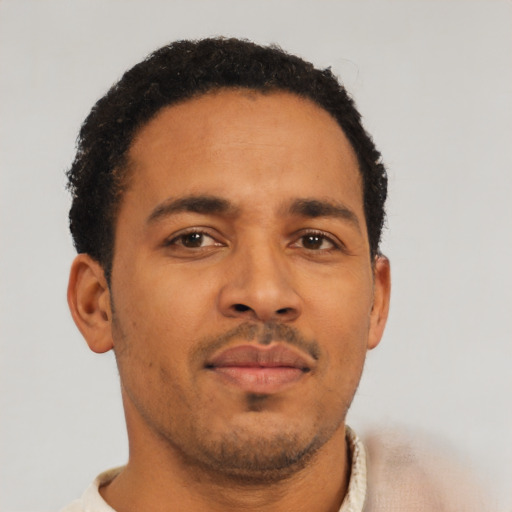 Neutral latino adult male with short  brown hair and brown eyes