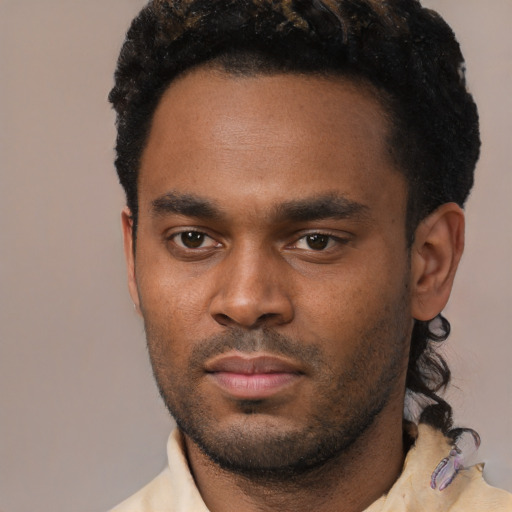 Neutral black young-adult male with short  black hair and brown eyes