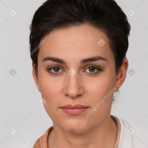 Neutral white young-adult female with short  brown hair and brown eyes