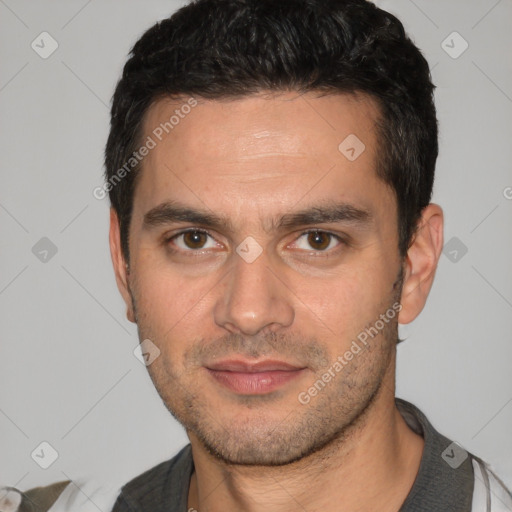 Joyful white young-adult male with short  black hair and brown eyes