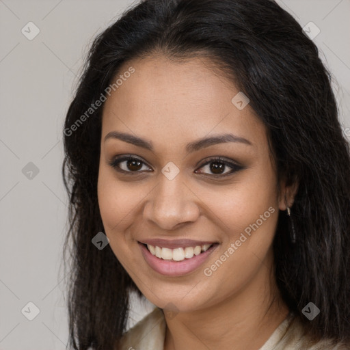 Joyful latino young-adult female with long  brown hair and brown eyes