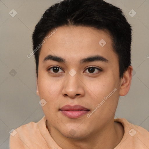 Joyful white young-adult male with short  black hair and brown eyes