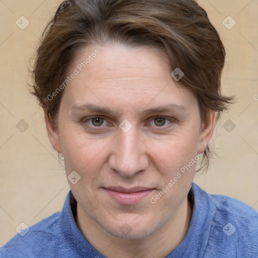 Joyful white adult female with medium  brown hair and blue eyes