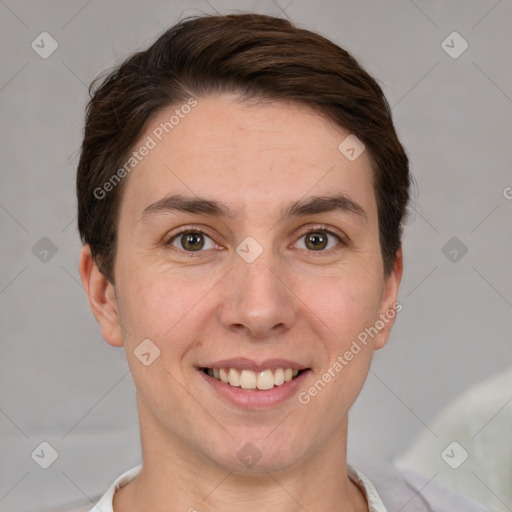 Joyful white young-adult female with short  brown hair and grey eyes