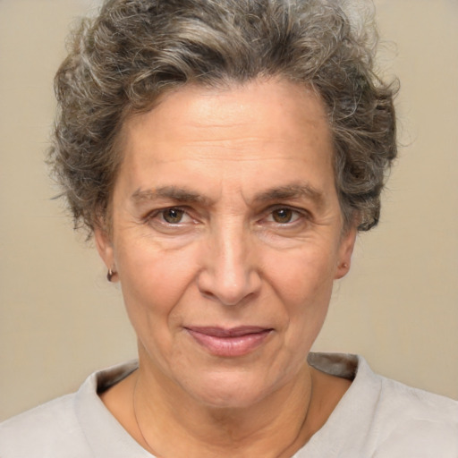 Joyful white middle-aged female with short  brown hair and brown eyes