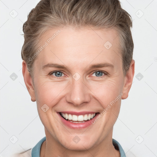 Joyful white young-adult female with short  brown hair and grey eyes