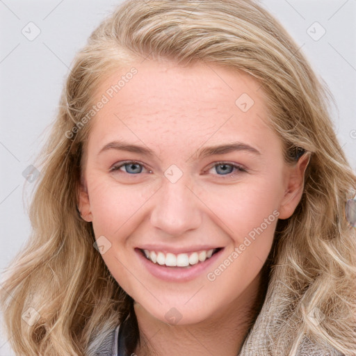 Joyful white young-adult female with long  brown hair and blue eyes