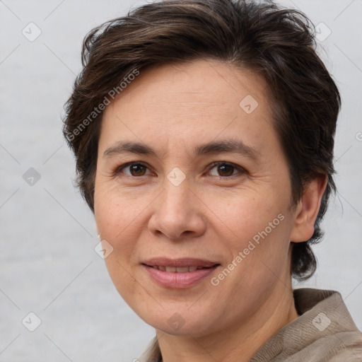 Joyful white adult female with short  brown hair and brown eyes