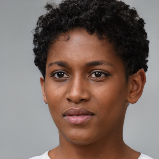 Neutral black young-adult female with short  black hair and brown eyes