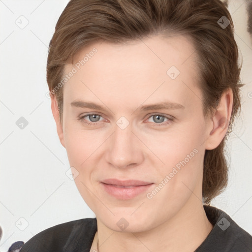 Joyful white young-adult female with medium  brown hair and grey eyes