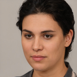 Joyful white young-adult female with medium  brown hair and brown eyes