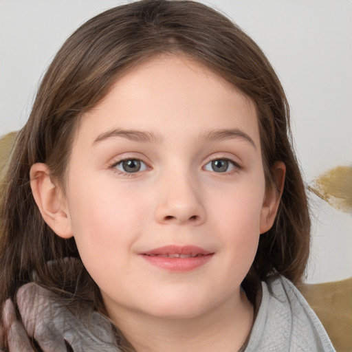 Joyful white child female with medium  brown hair and grey eyes