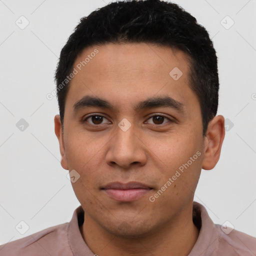 Joyful latino young-adult male with short  black hair and brown eyes