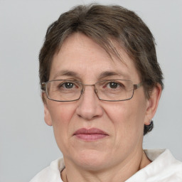 Joyful white middle-aged female with short  brown hair and brown eyes