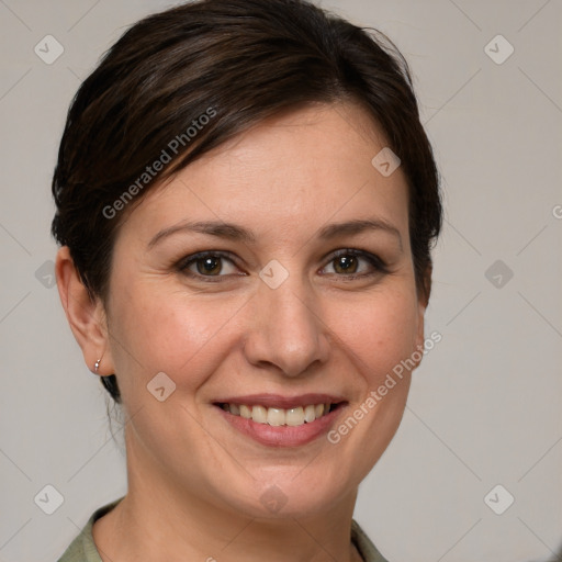 Joyful white young-adult female with medium  brown hair and grey eyes