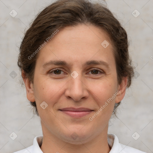 Joyful white adult female with short  brown hair and brown eyes