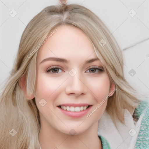 Joyful white young-adult female with medium  blond hair and blue eyes