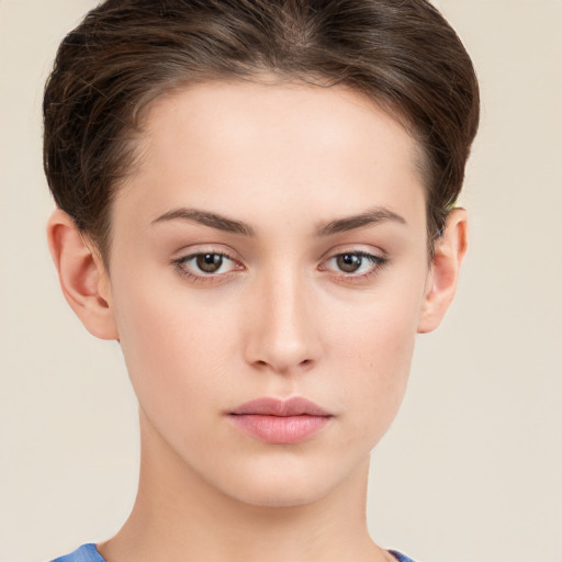 Neutral white young-adult female with short  brown hair and brown eyes