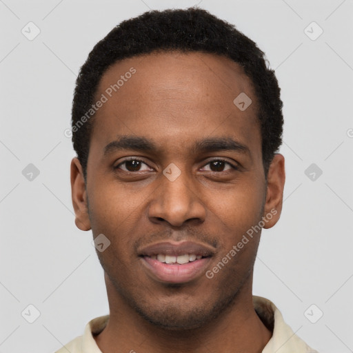 Joyful black young-adult male with short  black hair and brown eyes