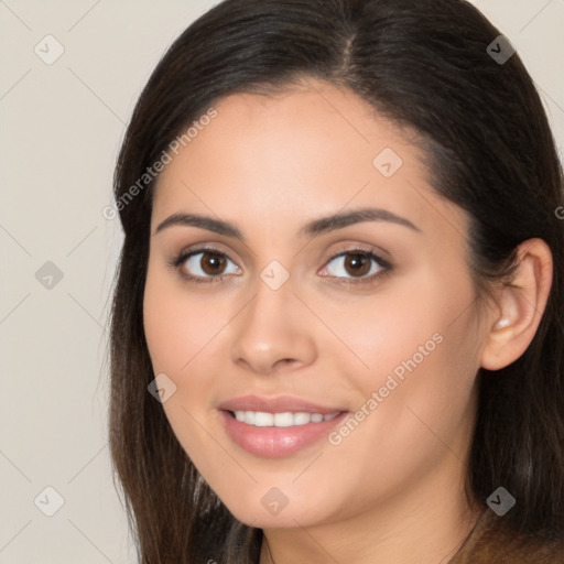 Joyful white young-adult female with long  brown hair and brown eyes