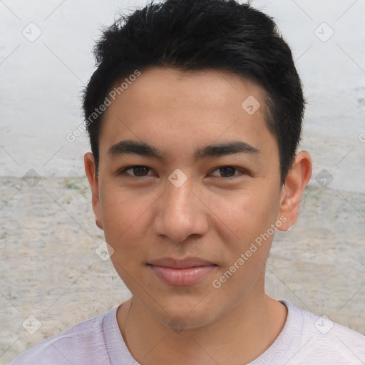 Joyful asian young-adult male with short  brown hair and brown eyes