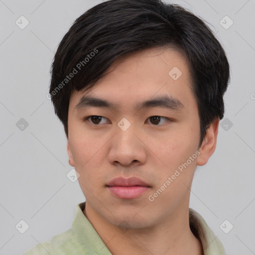 Neutral asian young-adult male with short  black hair and brown eyes