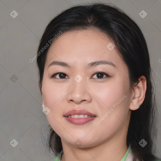 Joyful asian young-adult female with medium  brown hair and brown eyes