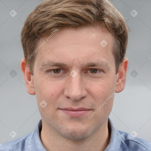 Joyful white adult male with short  brown hair and grey eyes