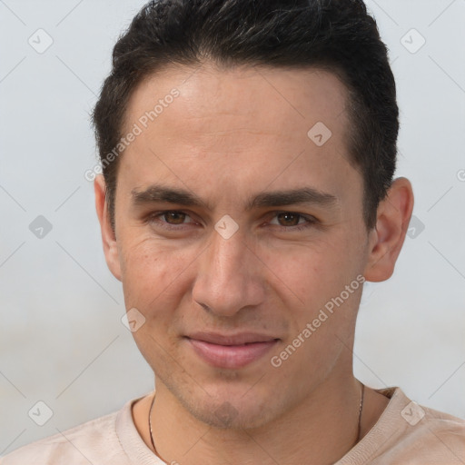 Joyful white young-adult male with short  brown hair and brown eyes