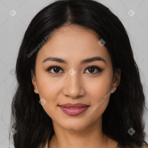 Joyful latino young-adult female with long  brown hair and brown eyes