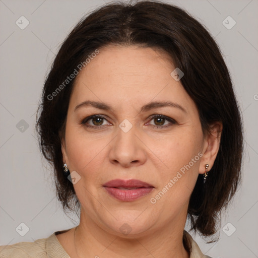 Joyful white adult female with medium  brown hair and brown eyes