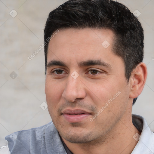 Joyful white young-adult male with short  black hair and brown eyes