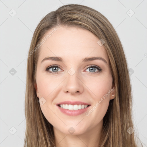 Joyful white young-adult female with long  brown hair and grey eyes