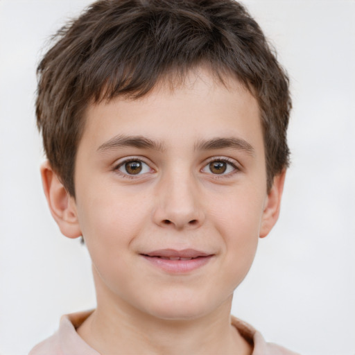 Joyful white child male with short  brown hair and brown eyes