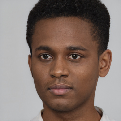 Neutral black young-adult male with short  brown hair and brown eyes
